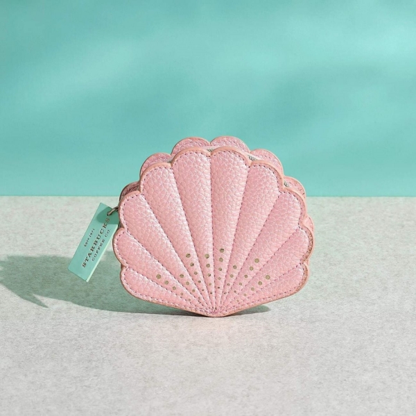 Shell shaped leather handbag